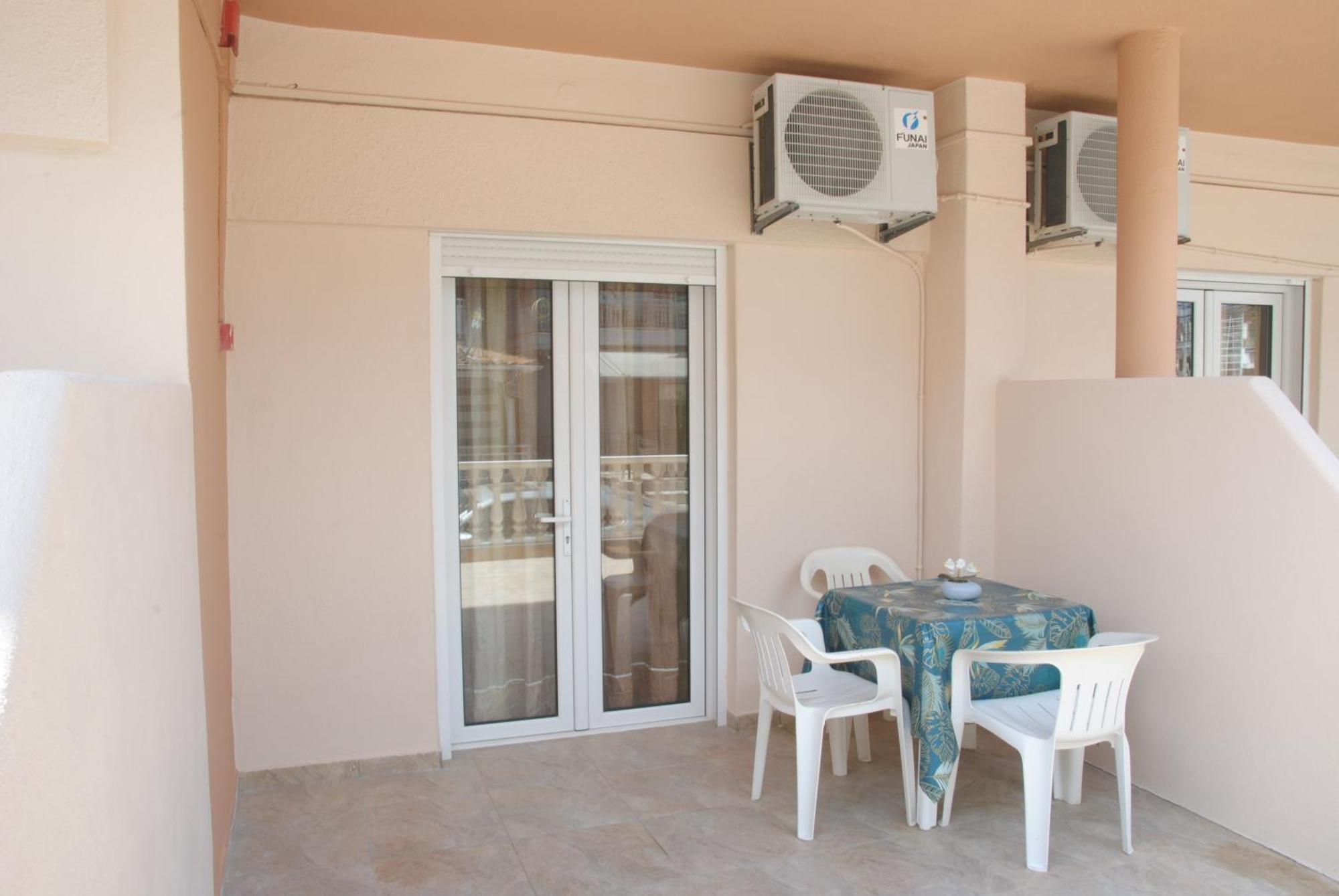 Light Blue Paralia Apartments Exterior photo